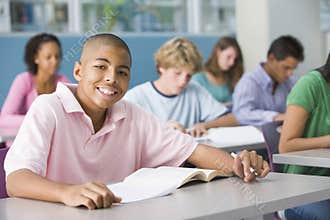 Schoolboy in high school class