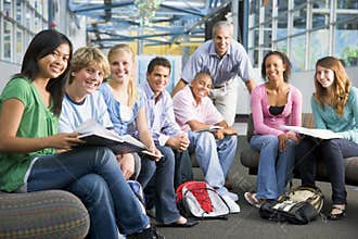 School children and their teacher in a class