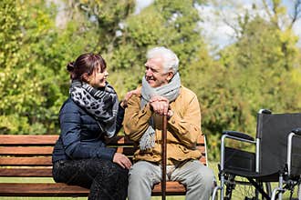 Elder man and carer