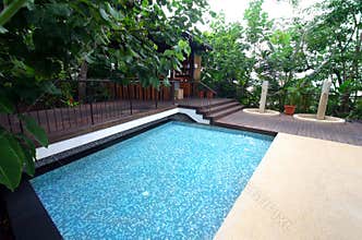 Hotel resort swimming pool & bar, tropical