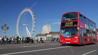 Bus on Westminster Bridge with London Eye