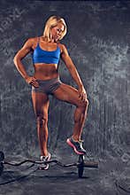 Athletic woman with weights