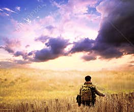 Solo Hiker Admiring Mountain View at Sunset – Freedom and Inner Journey