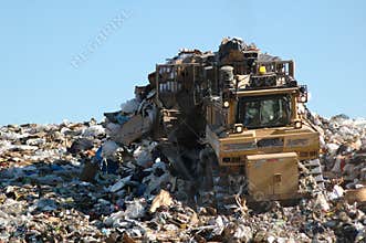 Dozer Pushing Garbage