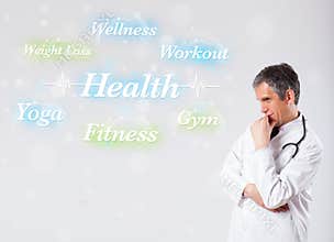 Clinical doctor pointing to health and fitness collection of words
