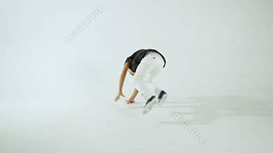 Little Stylish Boy Break Dancing And Having Fun, Isolated On WhiteStudio Shot