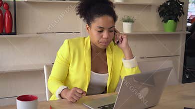 Sale manager consults client on the mobile phone.