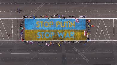 Aerial photography stop Putin,stop war sign on asphalt