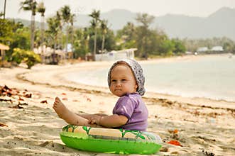 Baby on tropical beach