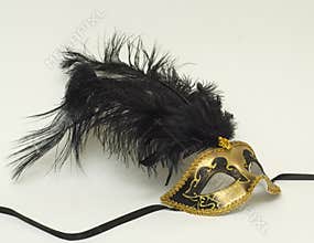 Gold mask with feathers