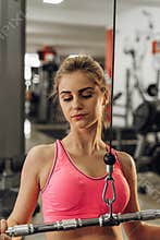 Blonde performs an exercise on the simulator