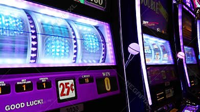 Close up woman playing slot machine