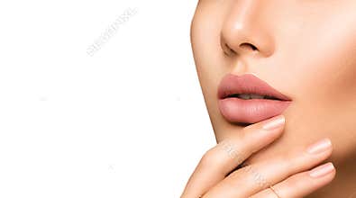 Perfect woman's lips with fashion natural beige matte lipstick