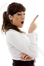 Side view of surprised female attorney pointing