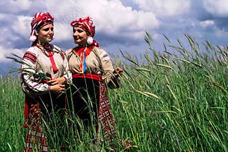 Girls in the Belarusian folk costume on the reconstruction of folk ebrard in the Gomel region.