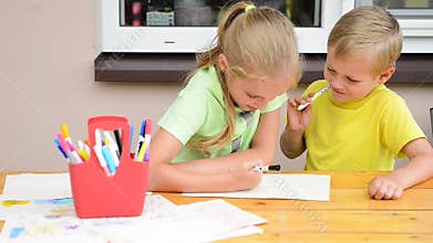Kids painting with pencils