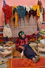 Moroccan weaver spinning yarn