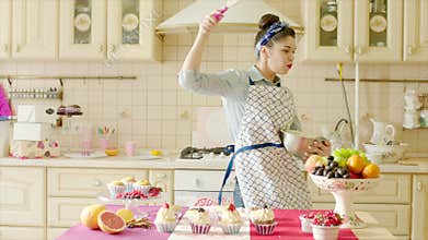 Happy woman having fun while working dough