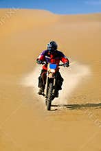 Moto racer in desert