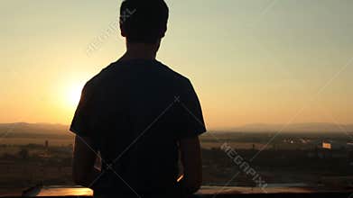 Man watching sunset