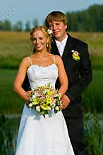 Newlyweds in formal pose