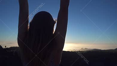 Woman Waving Her Arms In The Air