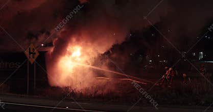 Tractor trailer burning after accident.