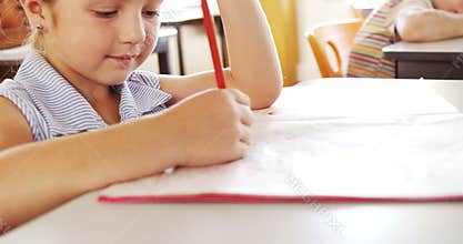 Girl studying in classroom