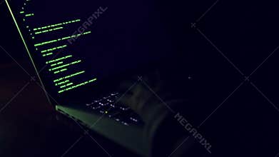 Hacker typing code.