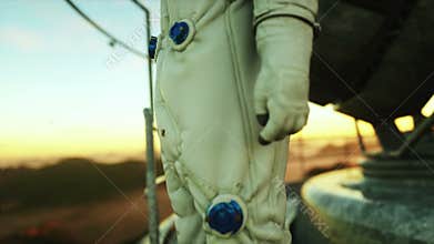 Alone astronaut on alien planet. Martian on metal base. Future concept. 4k