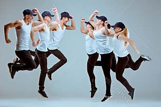 Group of men and women dancing hip hop choreography
