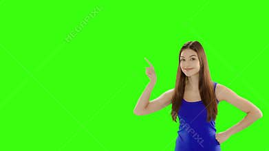 Beautiful woman is pointing her finger sideways.