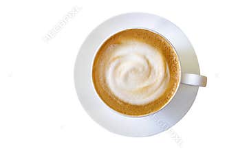 Top view of hot coffee cappuccino cup with milk foam isolated on