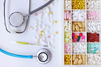 Different medication with stethoscope isolated