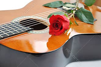 Classical guitar and rose.