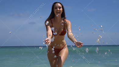 Beautiful happy woman on the beach