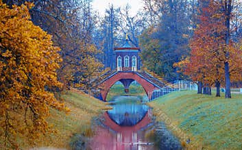 Autumn landscape with a Cross bridge.