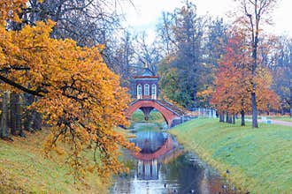 Autumn landscape with a Cross bridge.