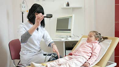 Physician receives patients, Sick child in hospital, pediatric clinic, cardiogram for children, cardiologist removes
