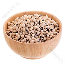 Black-eyed peas in a wooden bowl isolated on a white background