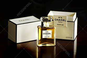 Chanel No 5 french perfume parfum bottle box isolated dark background