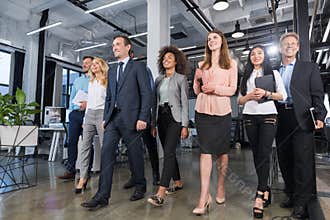Full Length Business People Team Walking In Modern Office, Confident Businessmen And Businesswomen In Suits Diverse With