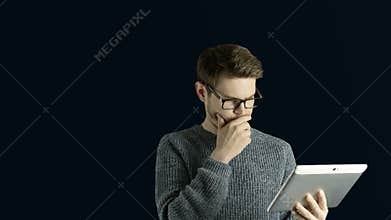 Clever hipster creative man think touch digital tablet ipad gets an idea, which jumps up as symbolic colored cartoon
