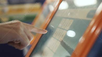 Atm machine close up hand entering pin number. Close up of the hand of woman pushing buttons for money cah in out