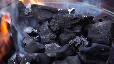 Charcoal burning in grill