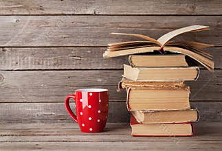 Old books and coffee cup