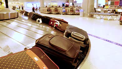 Luggage travels on a conveyor belt in the airport. 3840x2160, 4k