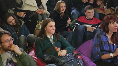 The audience laughing and applaud on the comic show