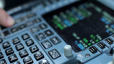 Cockpit cabin. Pilot switch controls aircraft a320