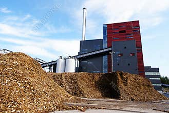 Bio power plant and storage of wooden fuel (biomass) against bl
